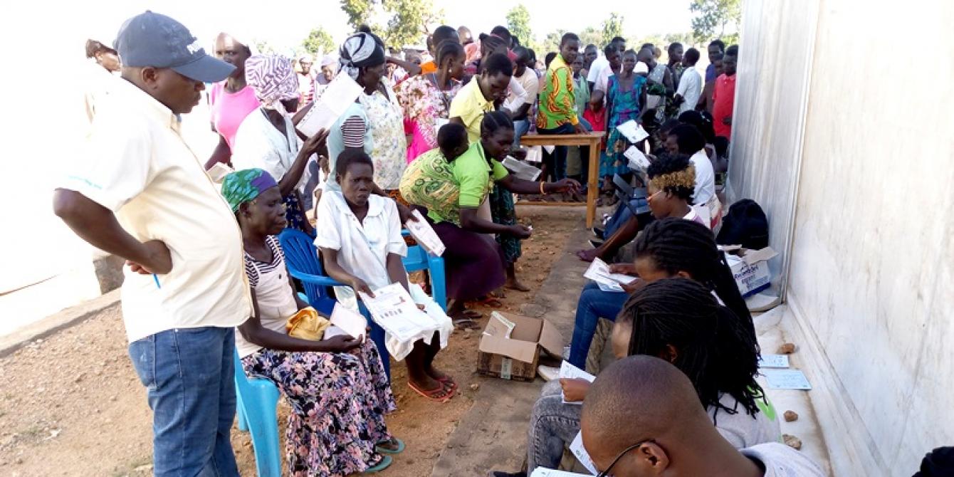 Oxfam officials verifying Refugees with special needs during cash distribution exercise in Imvepi Photo By Robert Ariaka/Oxfam Oxfam officials verifying Refugees with special needs during cash distribution exercise in Imvepi Photo By Robert Ariaka/Oxfam